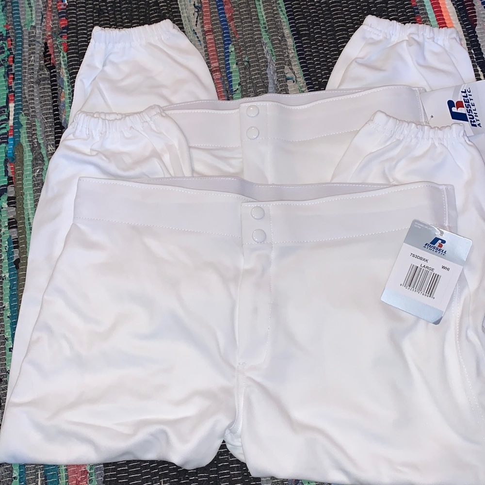 2 pair of White russel softball/baseball pants